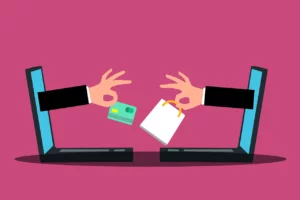 Illustration of two laptops with arms coming out of them, exchanging a credit card for a shopping bag