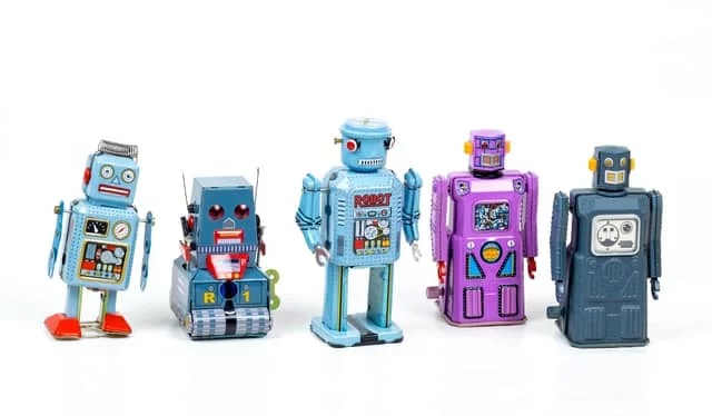 A row of assorted toy robots